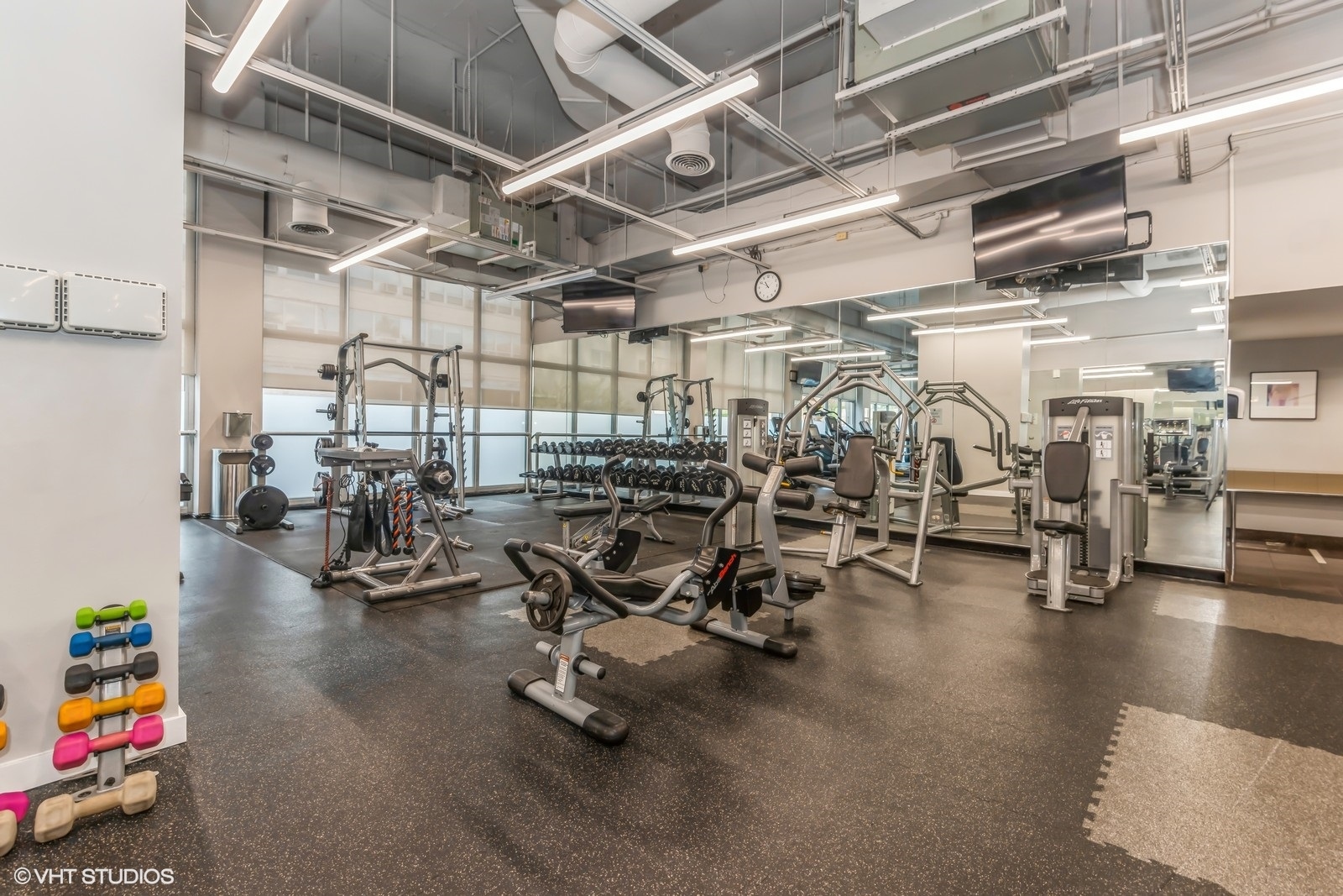 655 West Irving Park Road, Unit 1911 Chicago, IL 60613 - Photo 26 of 27 a view of a room with gym equipment