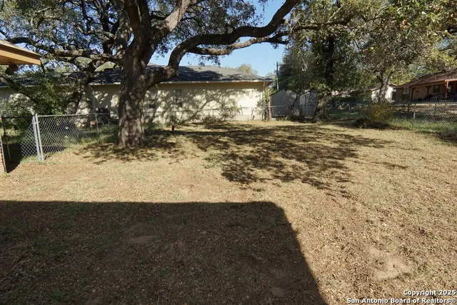 a view of yard covered with snow