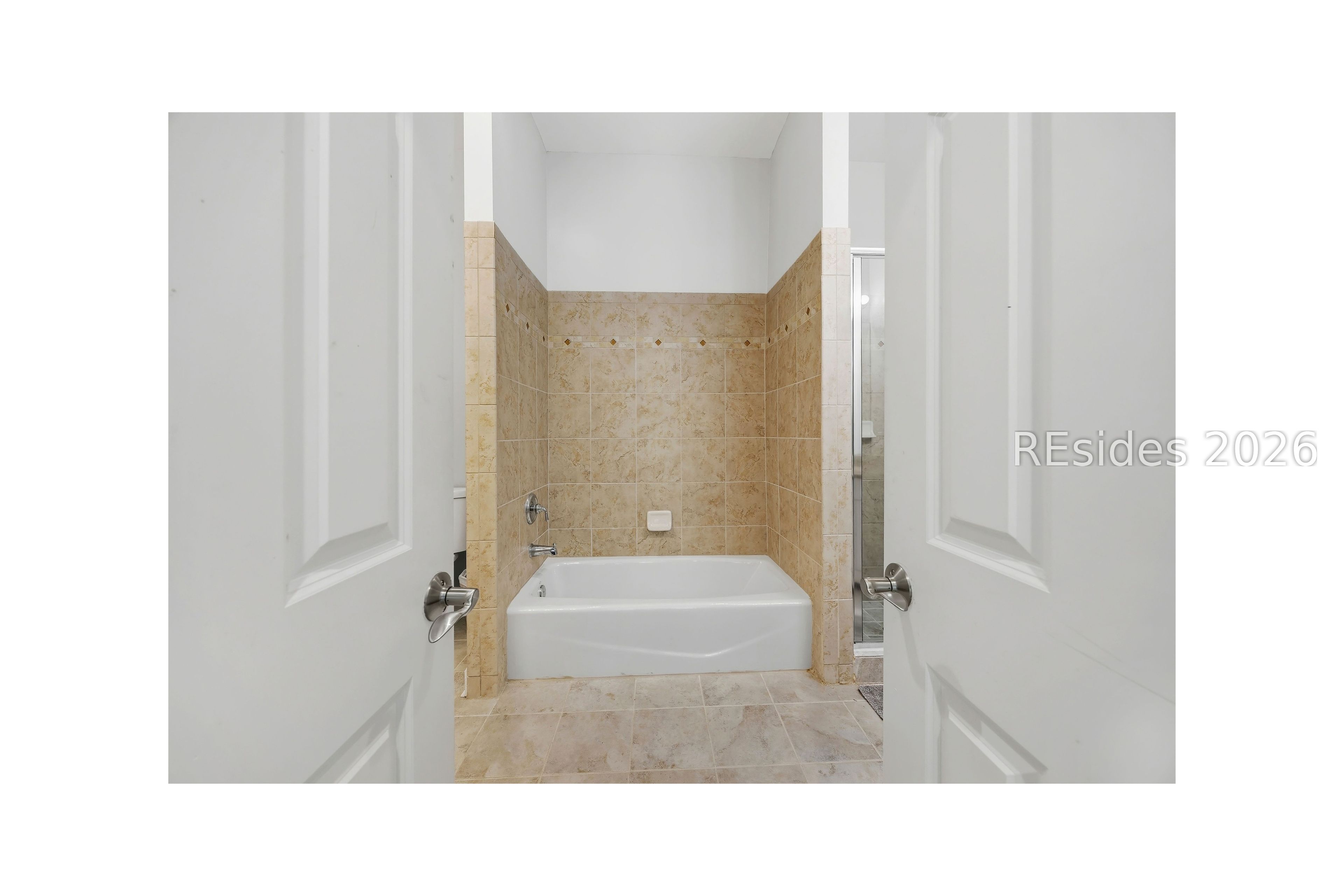 23 Augustine Road Bluffton, SC 29910 - Photo 23 of 53 Double doors lead to the primary bathroom