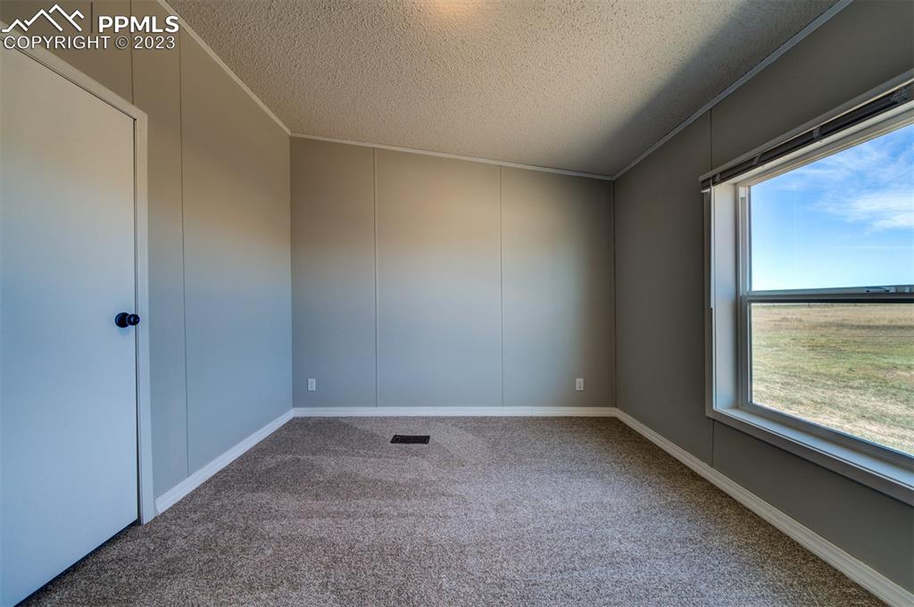 33220 Fossinger Road Yoder, CO 80864 - Photo 16 of 21 a view of room with window
