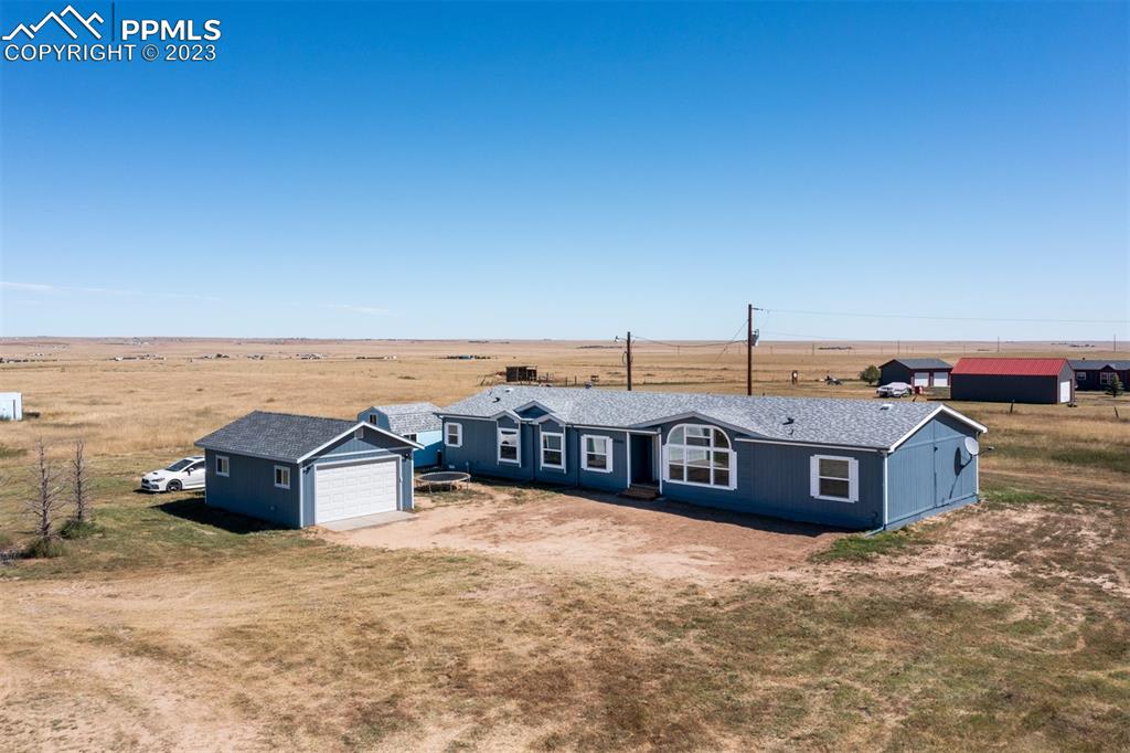 33220 Fossinger Road Yoder, CO 80864 - Photo 20 of 21 a view of a big room with an ocean view