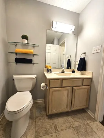 a bathroom with a sink and a toilet