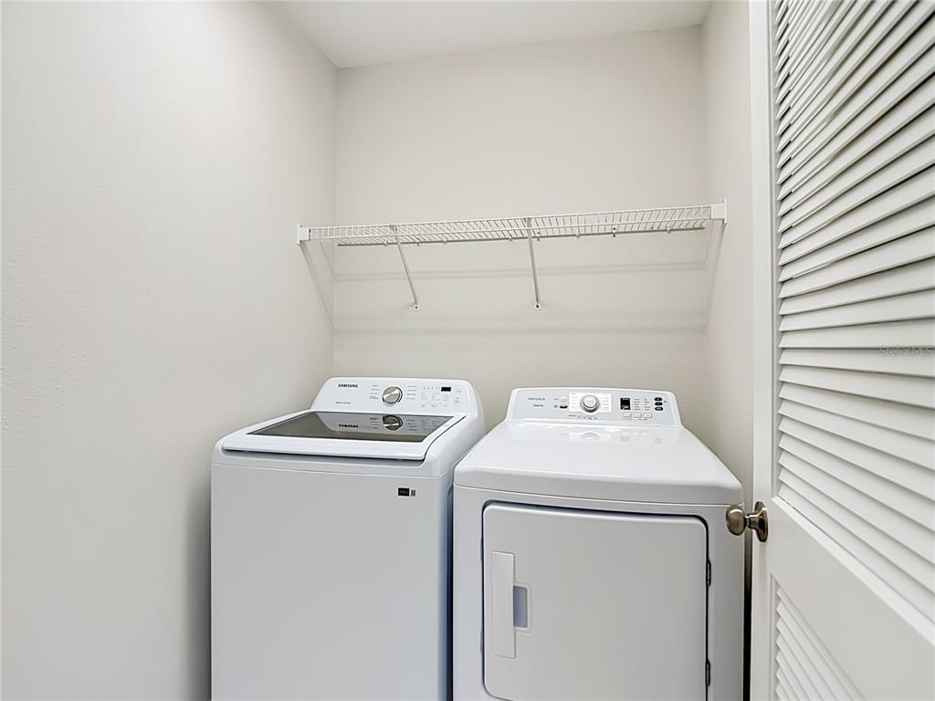 5310 Anhinga Trail New Port Richey, FL 34653 - Photo 23 of 27 a utility room with dryer and washer