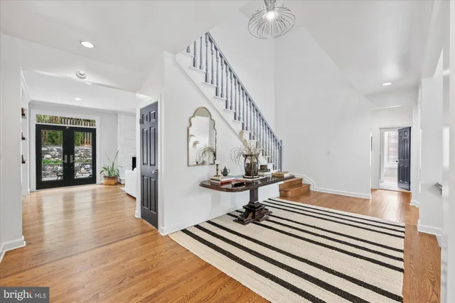 a view of a living room and wooden floor