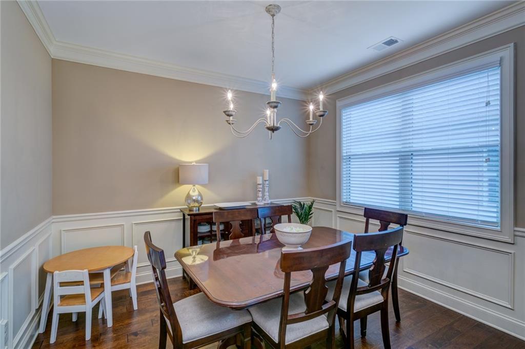 2443 Barrett Preserve Court Marietta, GA 30064 - Photo 12 of 46 a view of a dining room with furniture and window