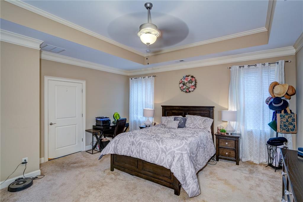 2443 Barrett Preserve Court Marietta, GA 30064 - Photo 14 of 46 a bedroom with a bed and table