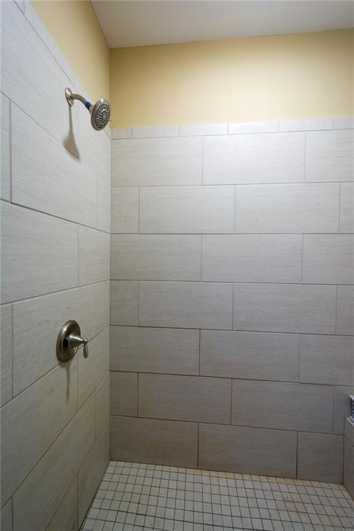 2443 Barrett Preserve Court Marietta, GA 30064 - Photo 19 of 46 a bathroom with a shower
