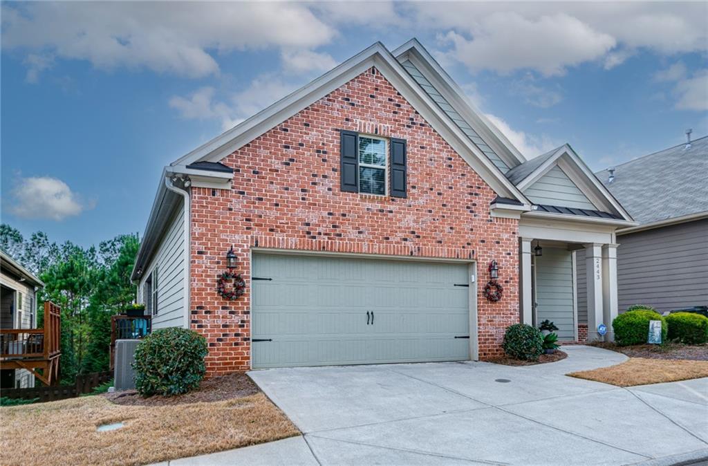 2443 Barrett Preserve Court Marietta, GA 30064 - Photo 46 of 46 a front view of a house with yard