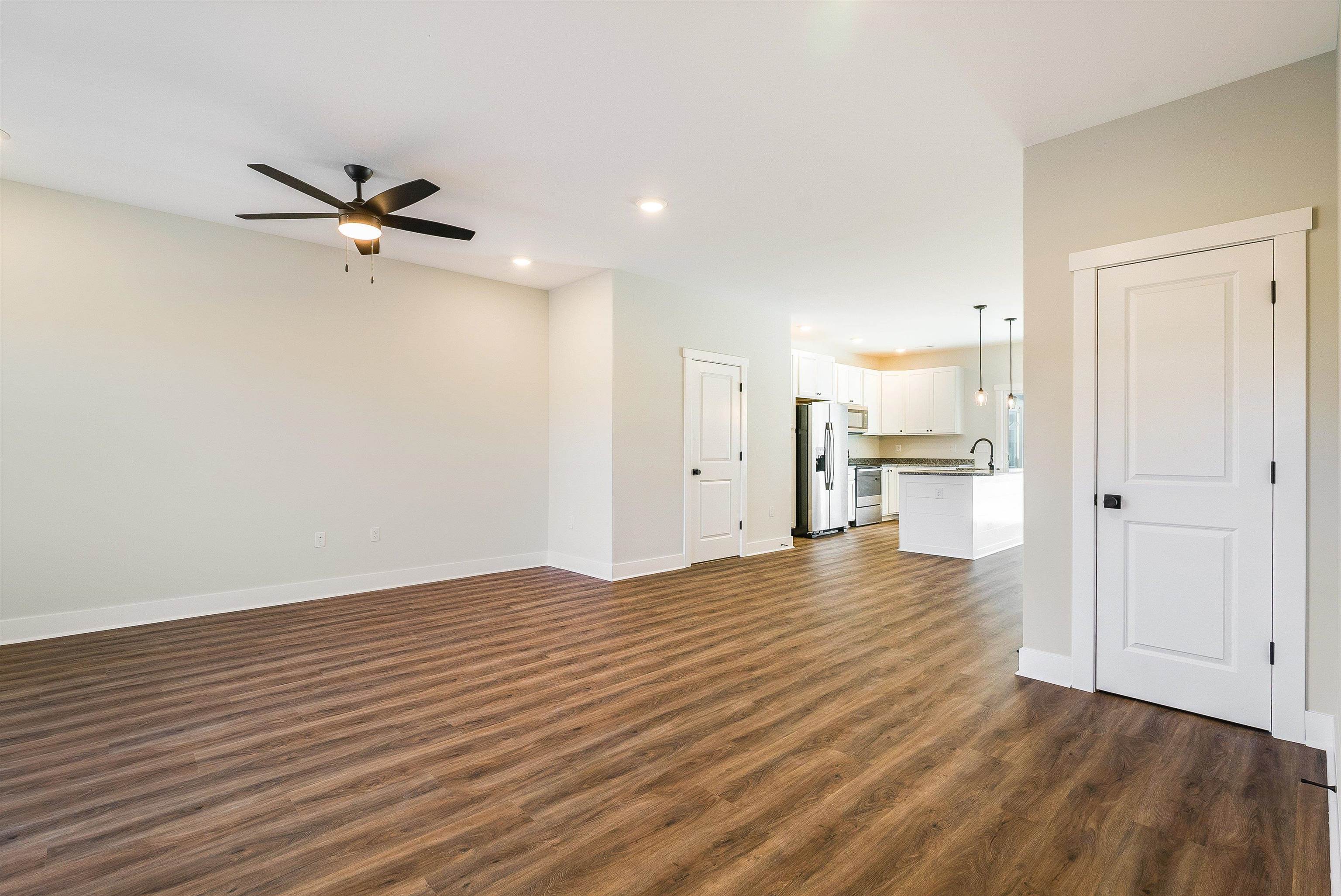 13 Barnyard Circle Bridgewater, VA 22812 - Photo 4 of 75 wooden floor in an empty room with a window