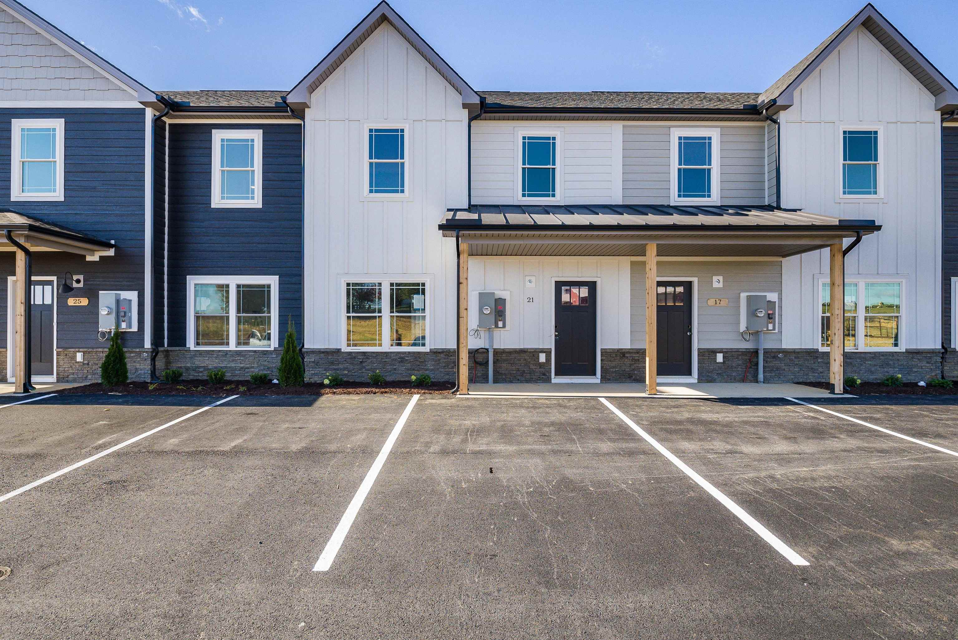 13 Barnyard Circle Bridgewater, VA 22812 - Photo 55 of 75 a front view of a house with a yard and a garage
