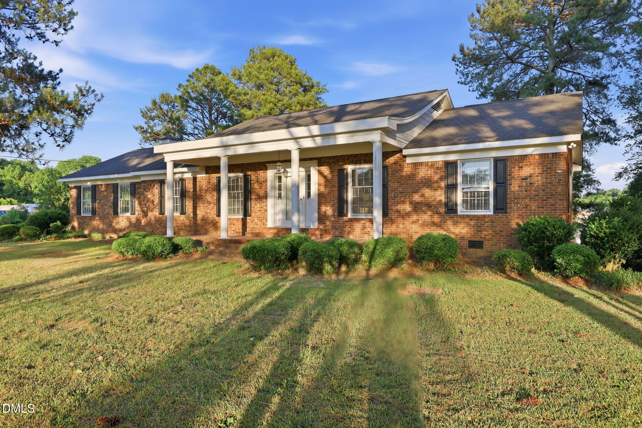 1130 Prospect Church Road Dunn, NC 28334 - Photo 43 of 47 a front view of a house with garden