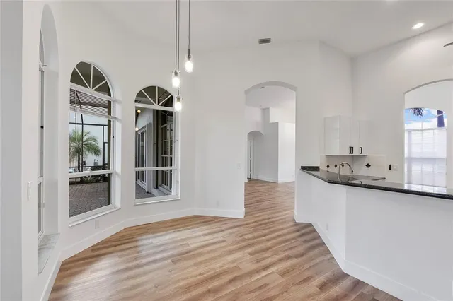 a view of a kitchen and a window
