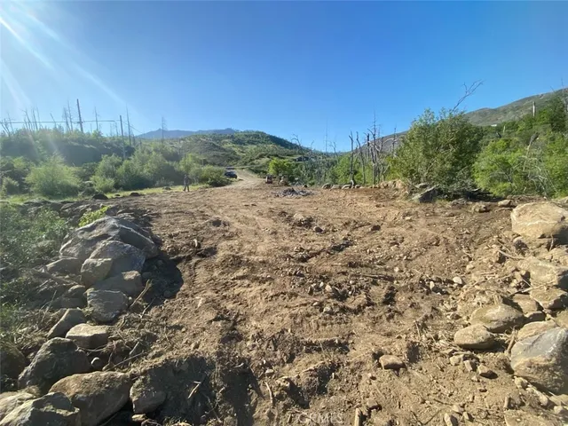 a view of a road with a yard
