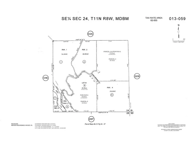 a view of a town with mountains in the background