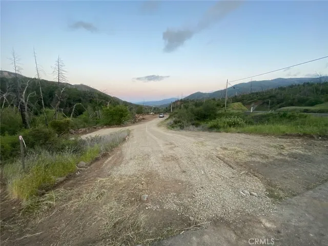 a view of a field with green space