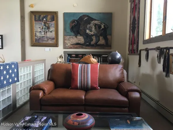 a living room with furniture and a couch