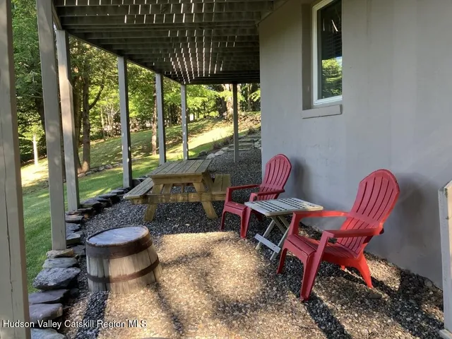 a outdoor living space with furniture and a potted plant