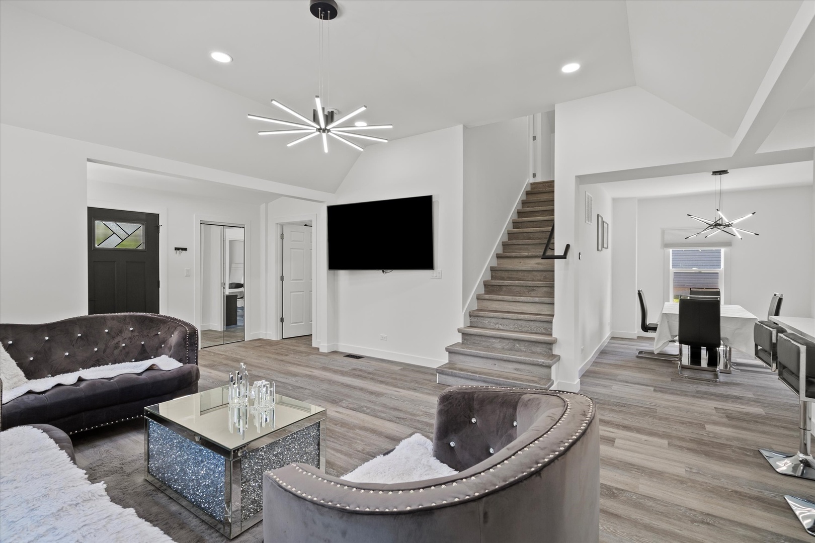 219 South Washington Street Lockport, IL 60441 - Photo 4 of 24 a living room with furniture and a flat screen tv