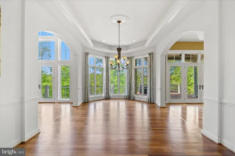 a stove top oven sitting inside of a kitchen
