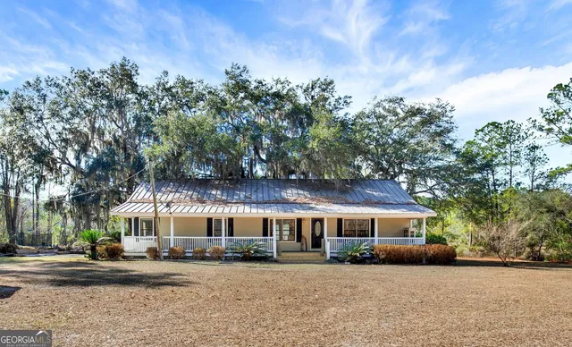 a front view of a building with garden