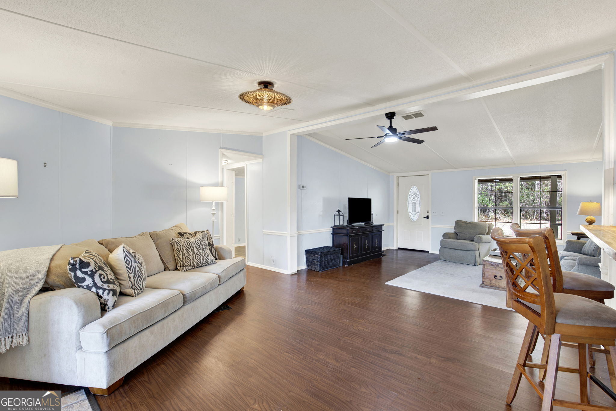 1262 Doodle Hill Road Northeast Townsend, GA 31331 - Photo 11 of 44 a living room with furniture and a fireplace