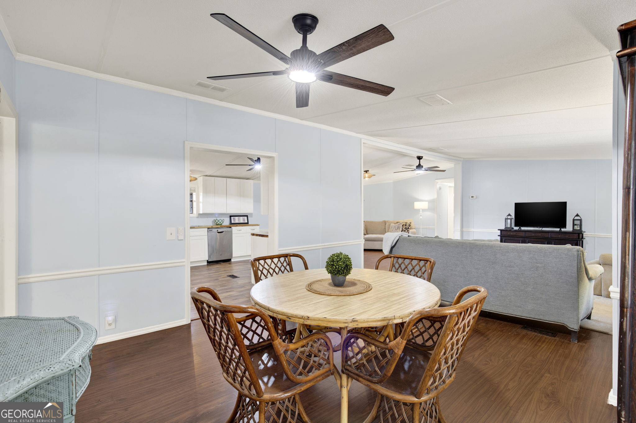 1262 Doodle Hill Road Northeast Townsend, GA 31331 - Photo 13 of 44 a view of a dining room with furniture and wooden floor
