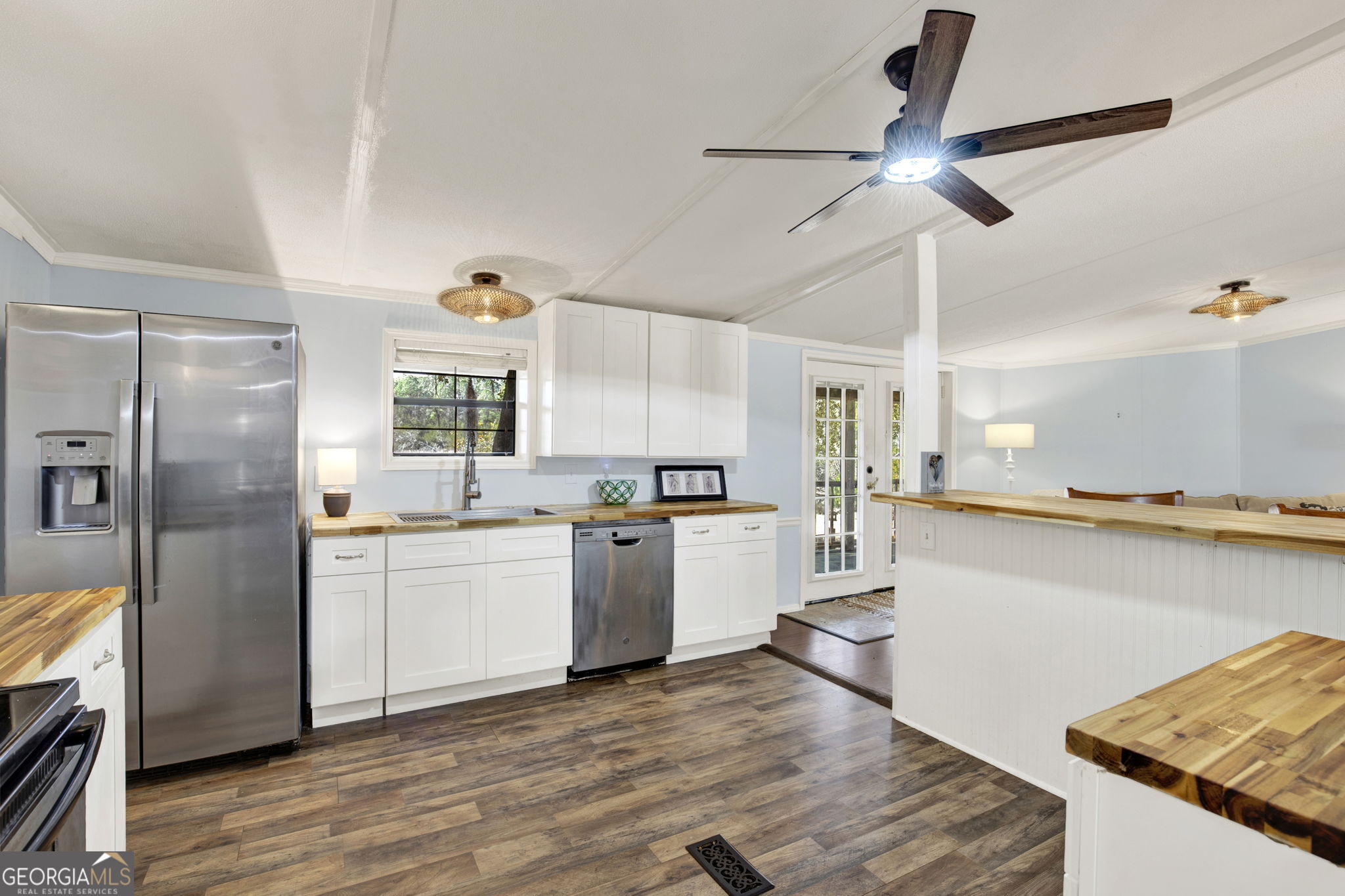 1262 Doodle Hill Road Northeast Townsend, GA 31331 - Photo 16 of 44 a kitchen with a sink stainless steel appliances and window