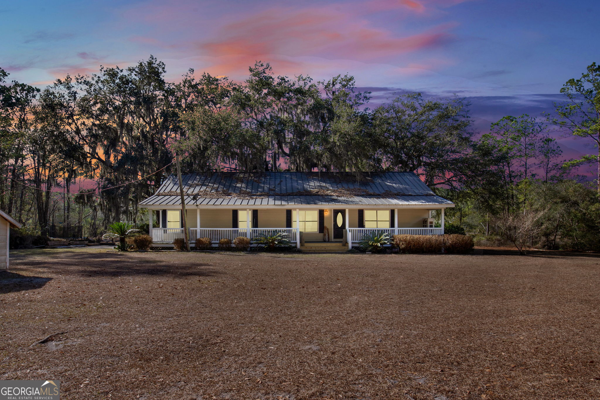1262 Doodle Hill Road Northeast Townsend, GA 31331 - Photo 2 of 44 a view of a house with a street