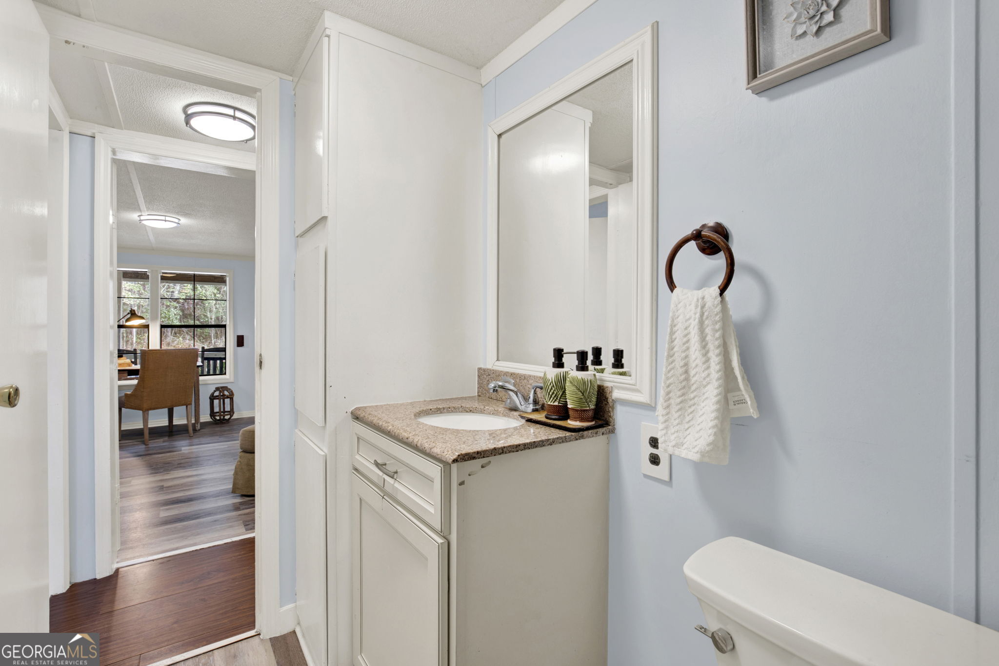 1262 Doodle Hill Road Northeast Townsend, GA 31331 - Photo 21 of 44 a bathroom with a sink a toilet and shower