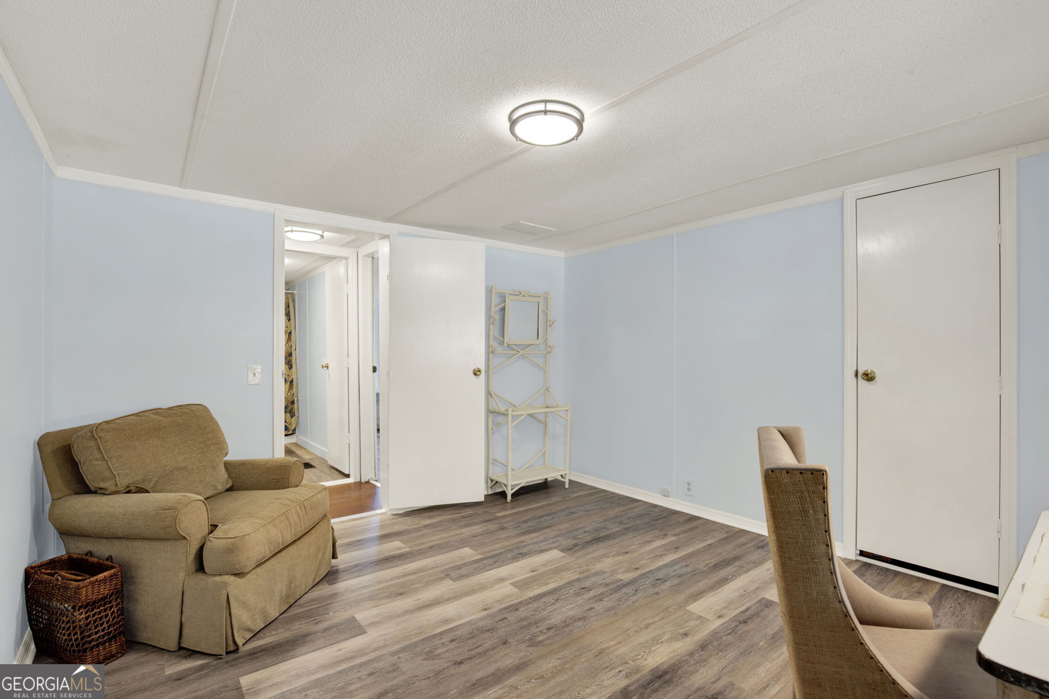 1262 Doodle Hill Road Northeast Townsend, GA 31331 - Photo 23 of 44 a bedroom with a bed and furniture