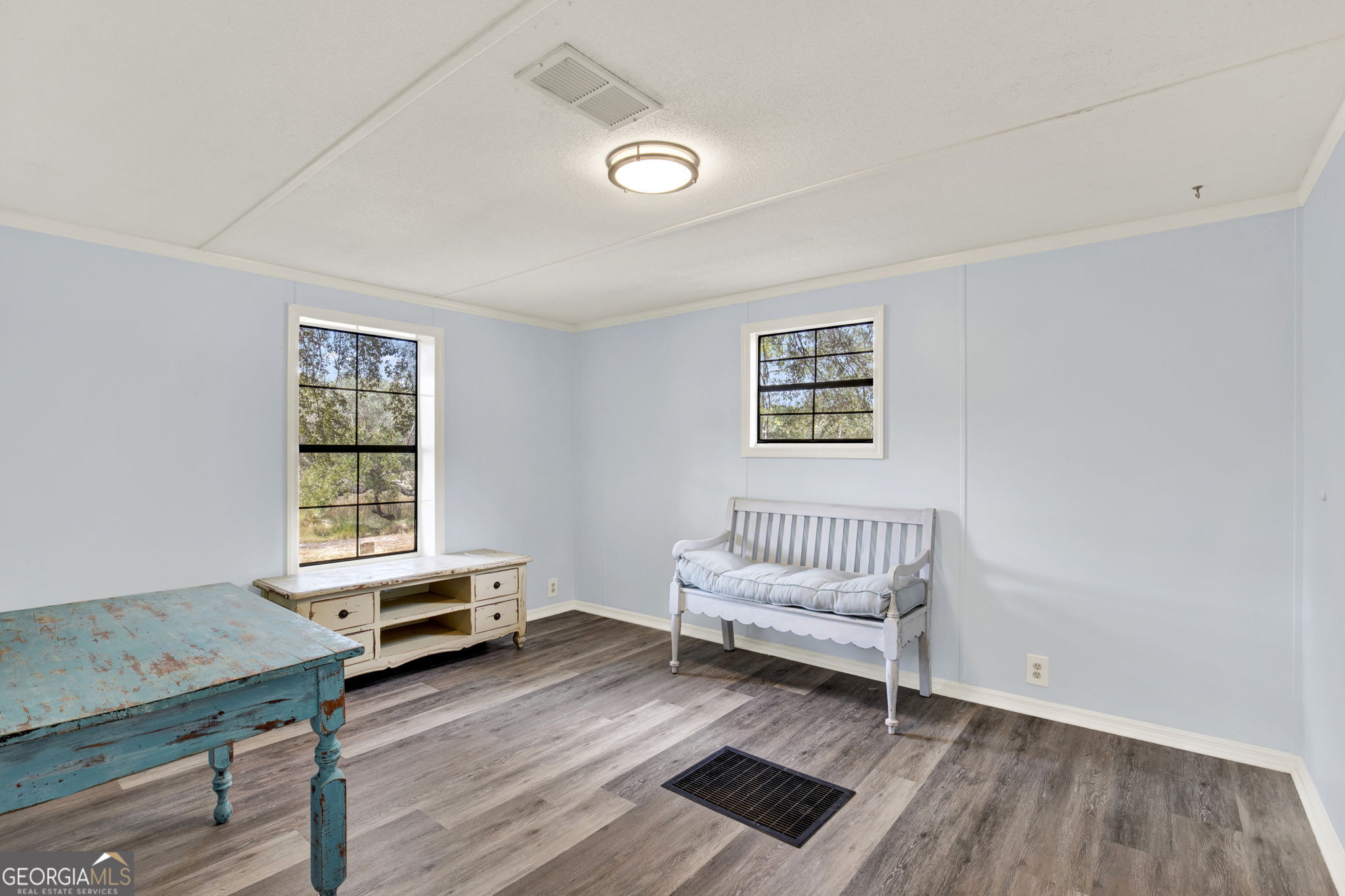 1262 Doodle Hill Road Northeast Townsend, GA 31331 - Photo 24 of 44 a living room with furniture and a window