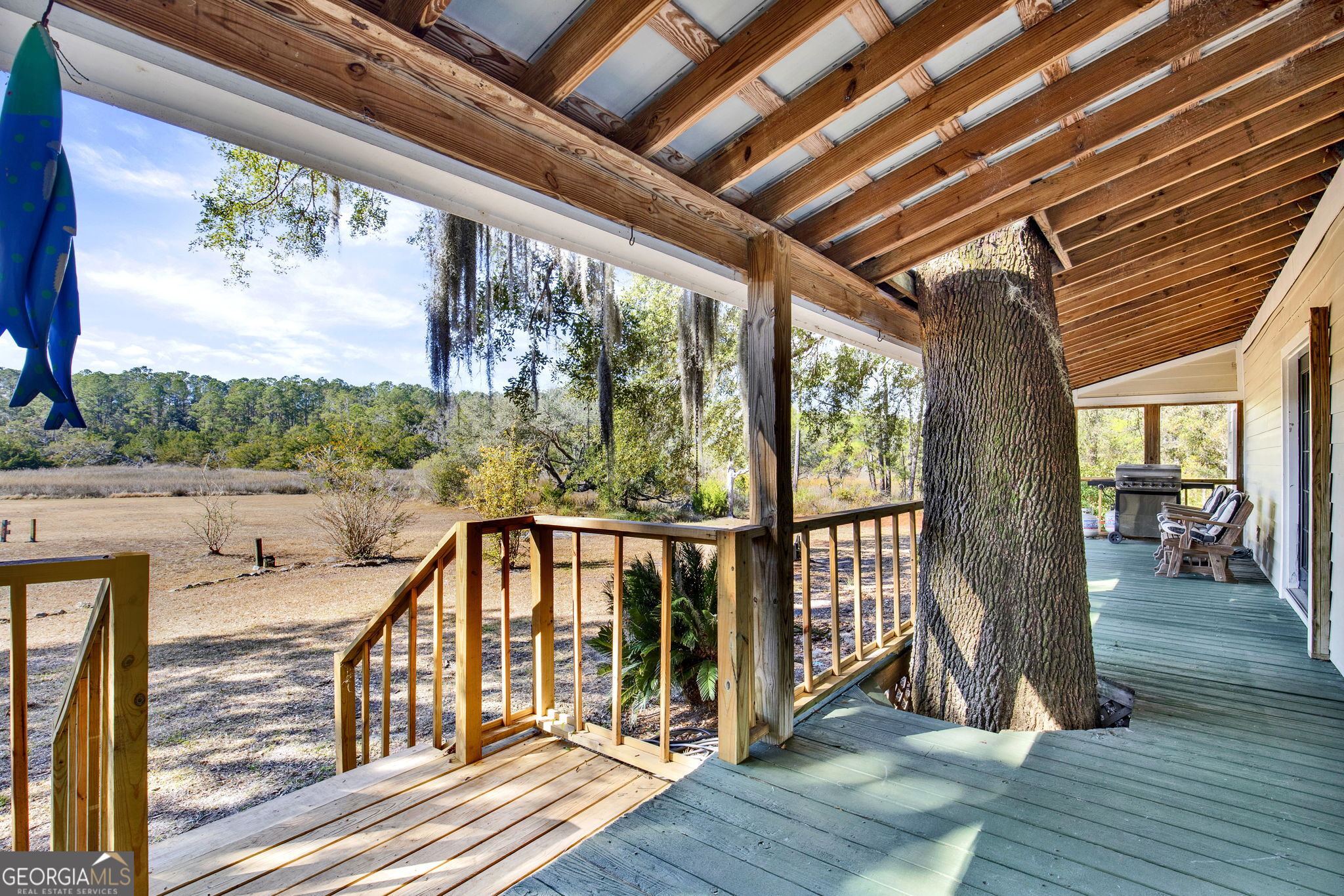 1262 Doodle Hill Road Northeast Townsend, GA 31331 - Photo 33 of 44 a view of balcony with wooden floor