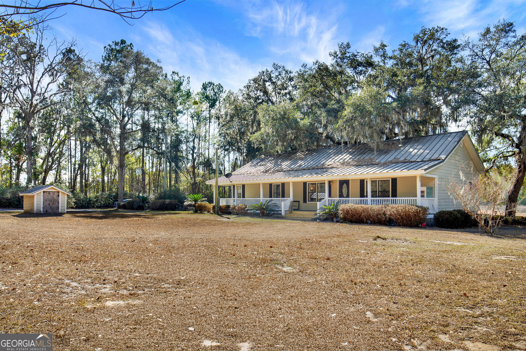 1262 Doodle Hill Road Northeast Townsend, GA 31331 - Photo 4 of 44 a front view of a house with a yard