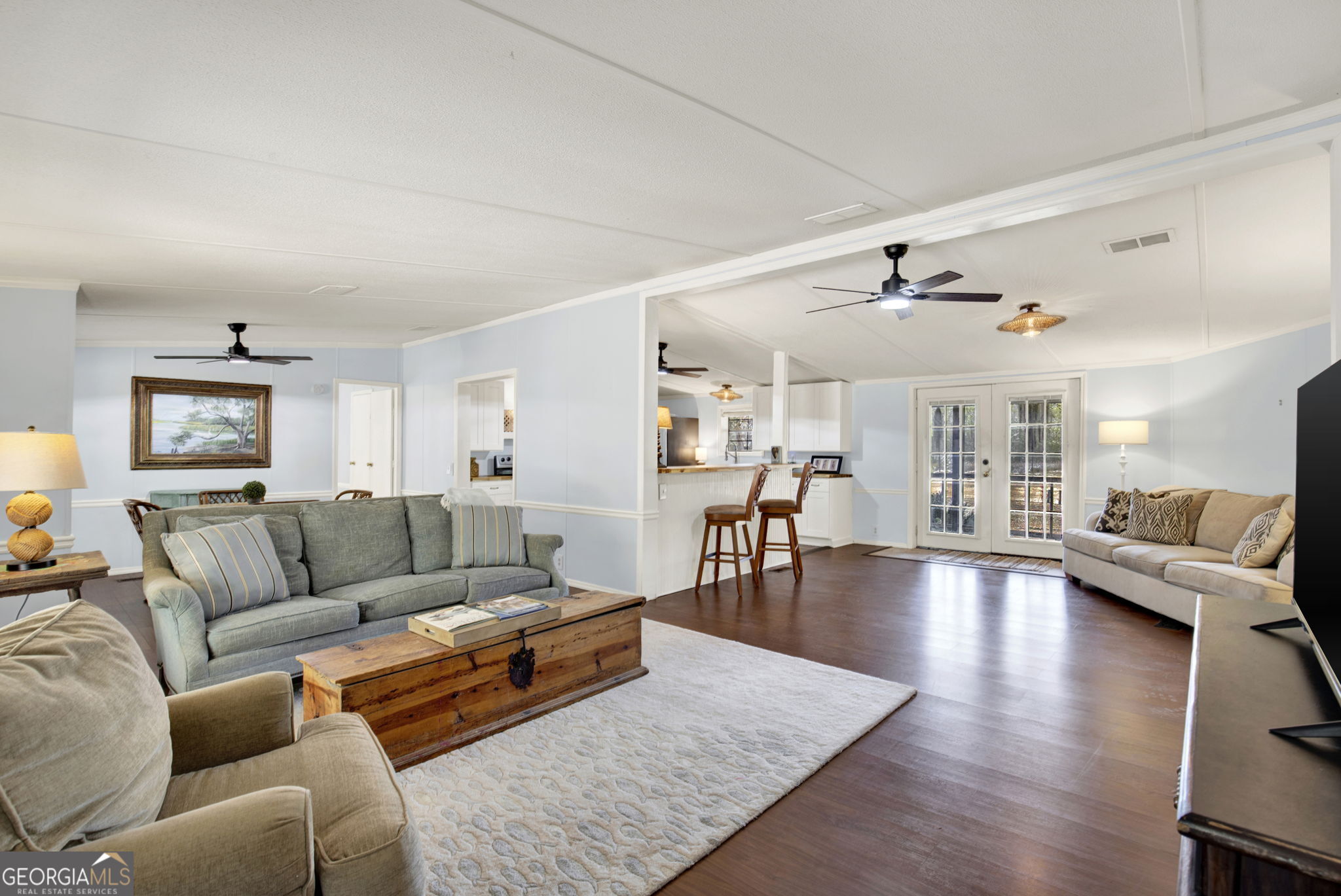 1262 Doodle Hill Road Northeast Townsend, GA 31331 - Photo 6 of 44 a living room with furniture and wooden floor