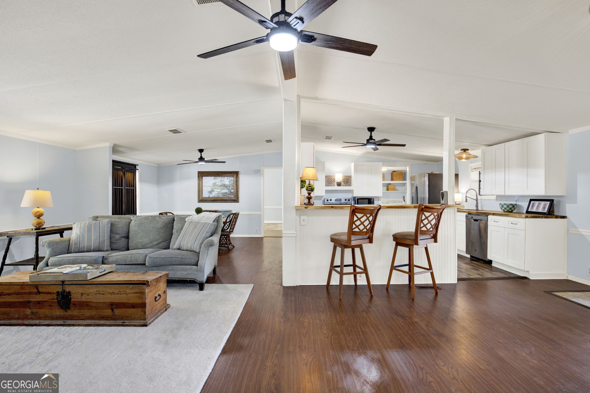 1262 Doodle Hill Road Northeast Townsend, GA 31331 - Photo 9 of 44 a living room with furniture and kitchen view
