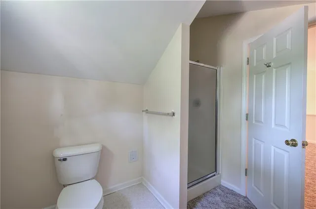 a bathroom with a toilet
