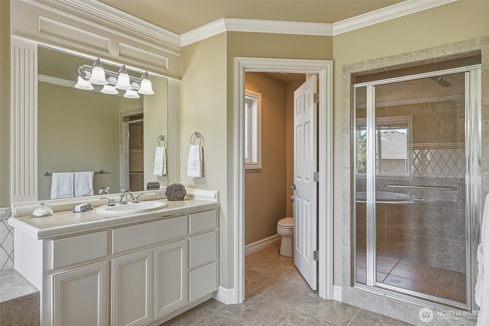 3932 221st Place Southeast Bothell, WA 98021 - Photo 24 of 36 a bathroom with a double vanity sink and a mirror