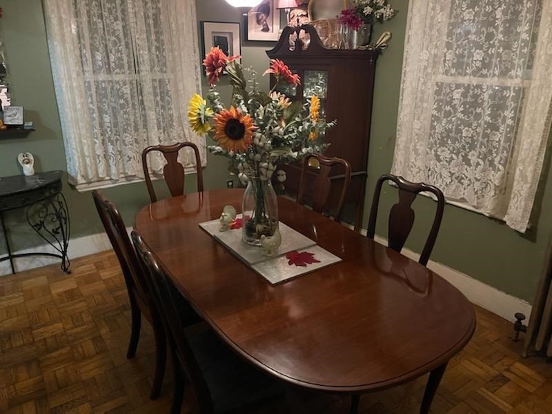 60 Bradlee Street Boston, MA 02136 - Photo 10 of 12 a dining room with furniture and wooden floor