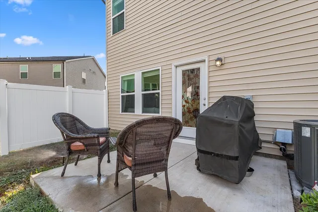 a building outdoor space with patio furniture