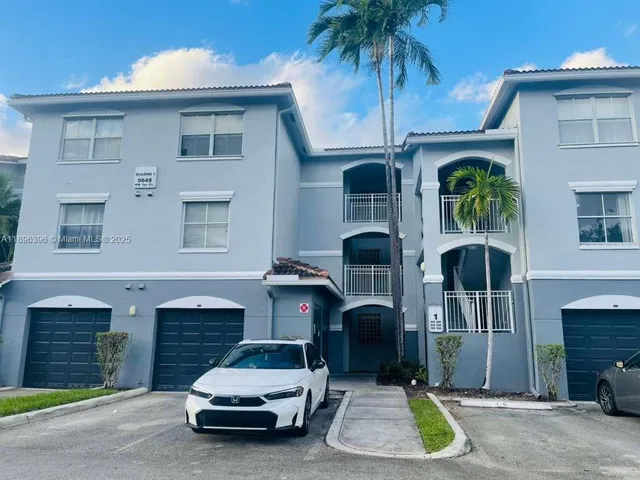 a car parked in front of a house