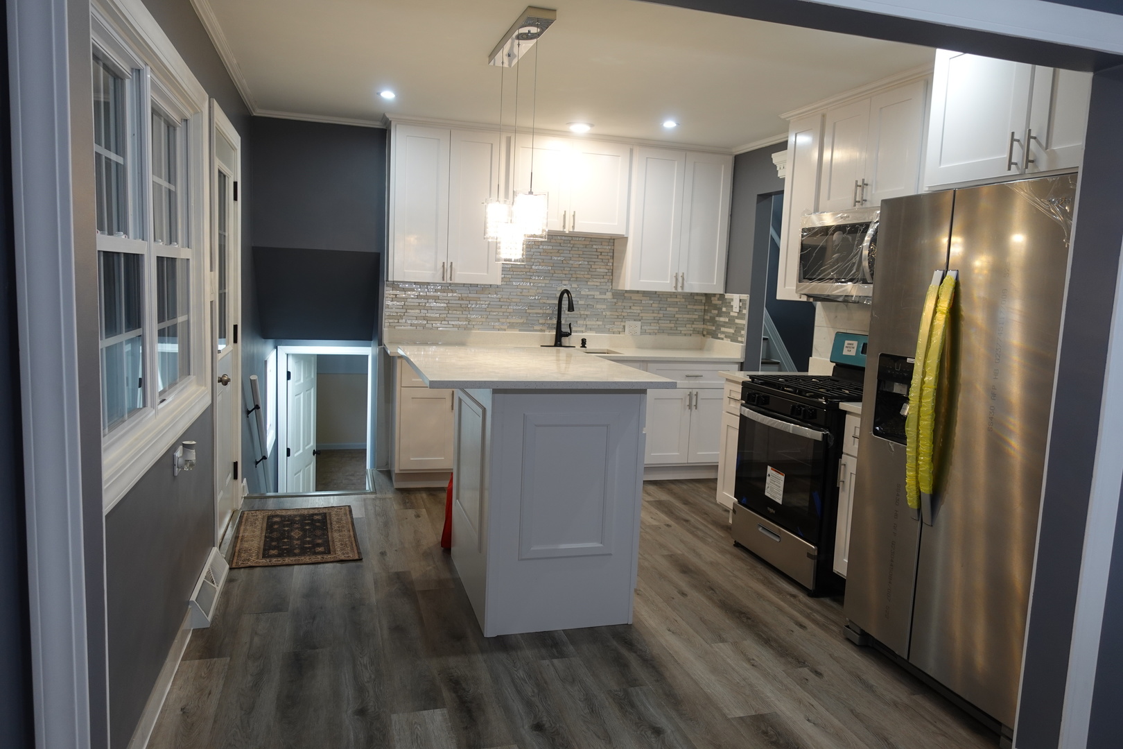 585 Ranger Drive Chicago Heights, IL 60411 - Photo 11 of 48 a kitchen with stainless steel appliances granite countertop a refrigerator a stove and a sink