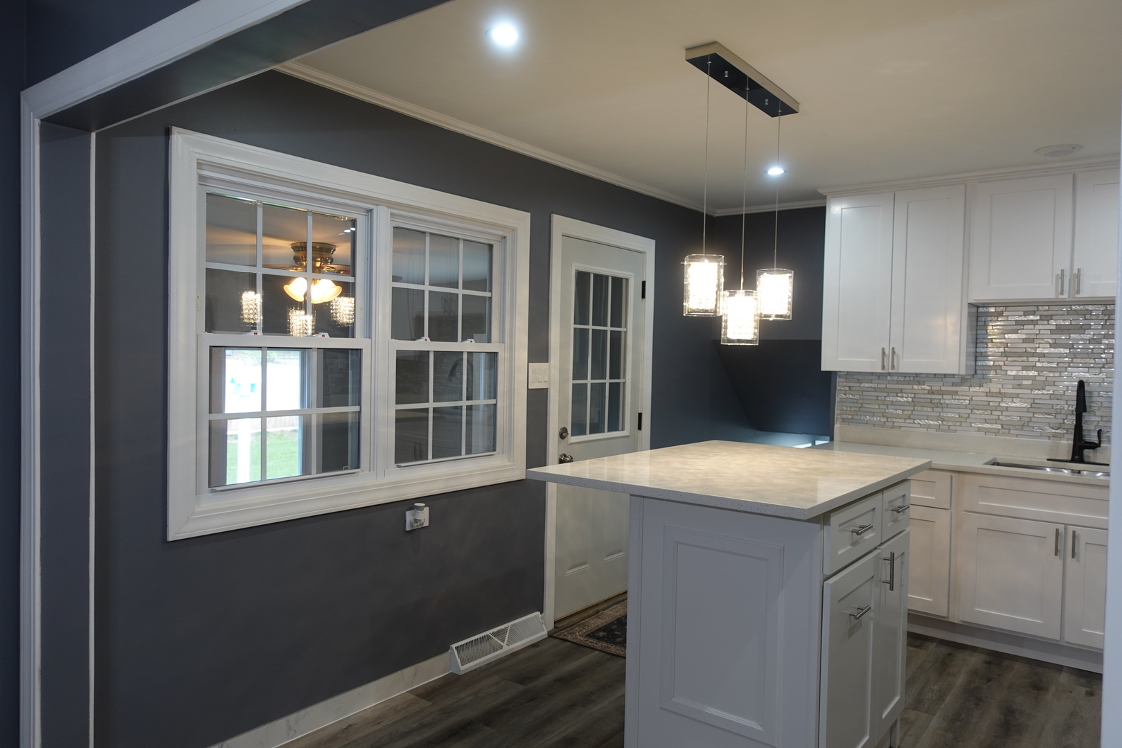 585 Ranger Drive Chicago Heights, IL 60411 - Photo 12 of 48 a kitchen with a sink and a window