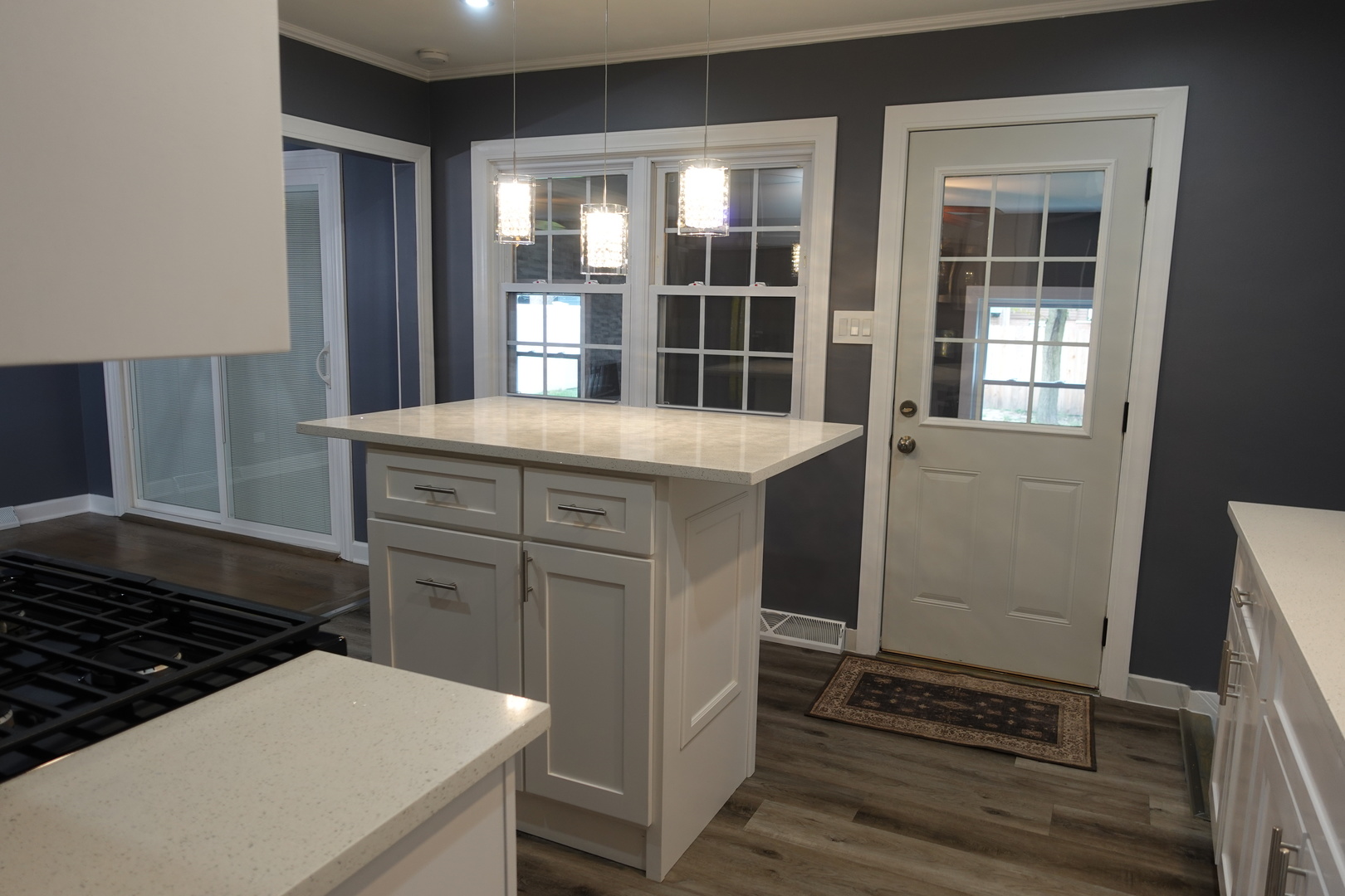 585 Ranger Drive Chicago Heights, IL 60411 - Photo 13 of 48 a kitchen that has a sink and a stove in it