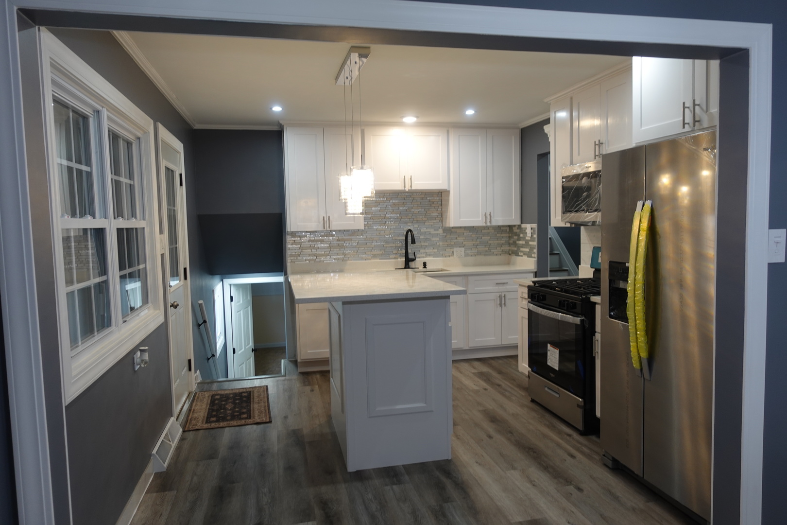 585 Ranger Drive Chicago Heights, IL 60411 - Photo 14 of 48 a kitchen with a sink stainless steel appliances and cabinets