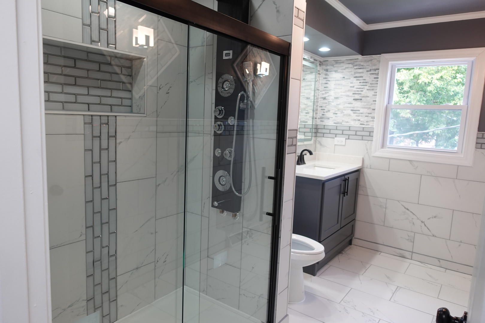 585 Ranger Drive Chicago Heights, IL 60411 - Photo 18 of 48 a bathroom with a shower and a sink