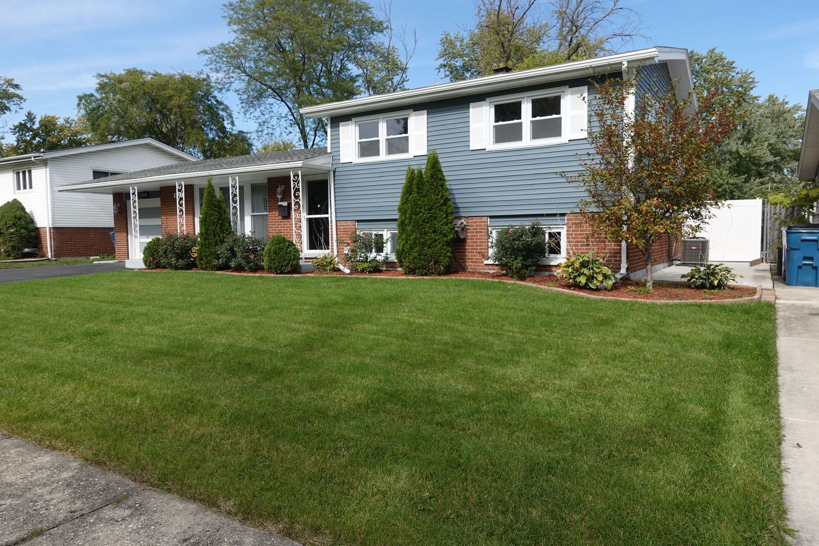 585 Ranger Drive Chicago Heights, IL 60411 - Photo 2 of 48 front view of a house with a yard