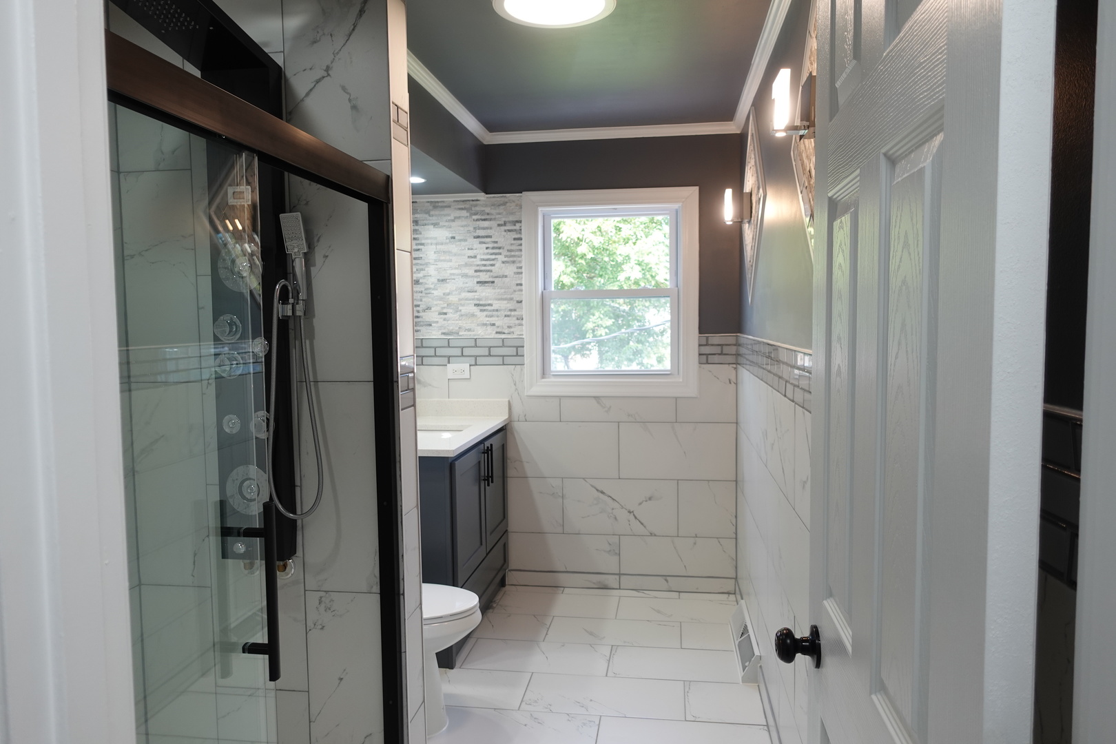 585 Ranger Drive Chicago Heights, IL 60411 - Photo 21 of 48 a bathroom with a shower and a sink