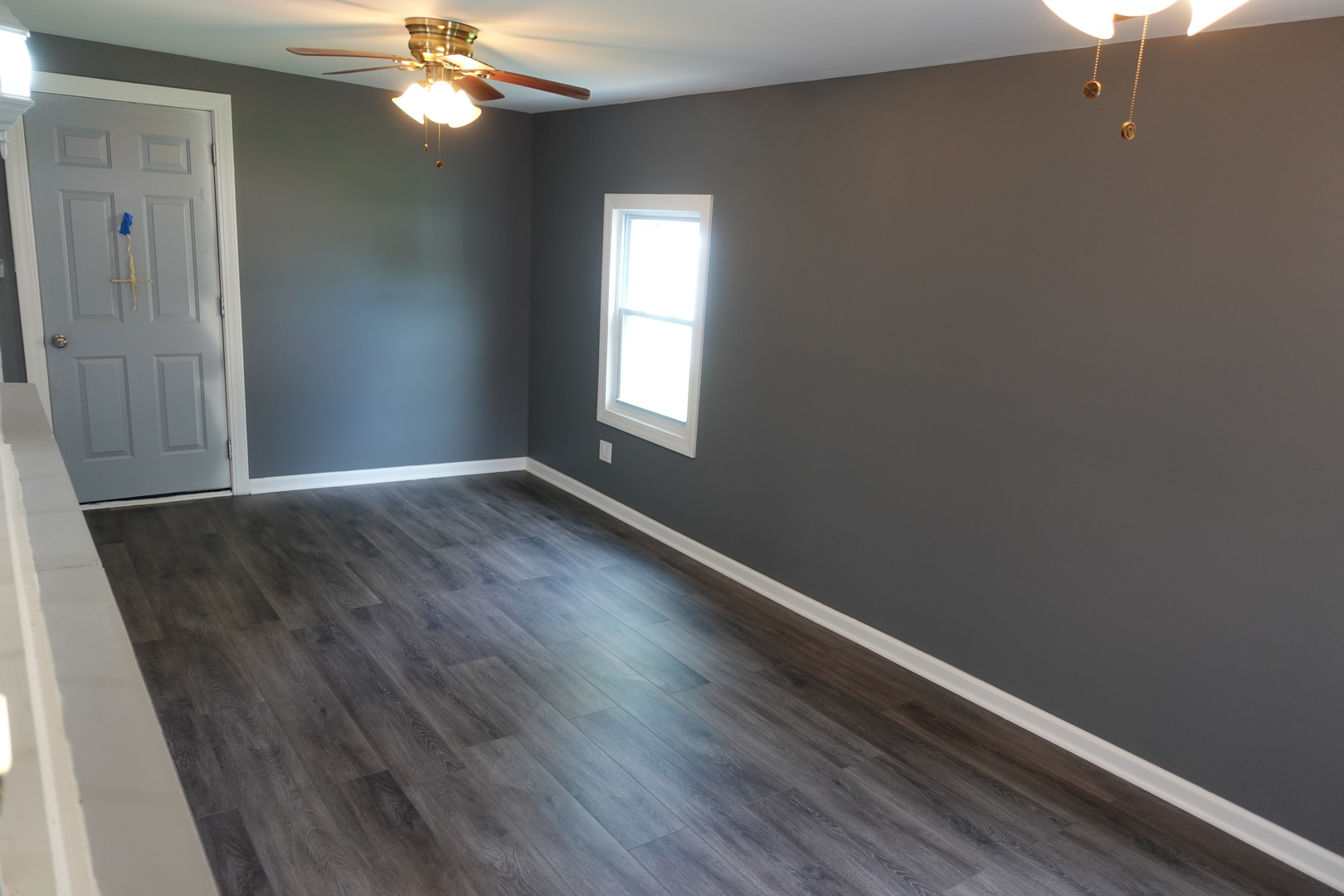 585 Ranger Drive Chicago Heights, IL 60411 - Photo 35 of 48 an empty room with wooden floor and windows