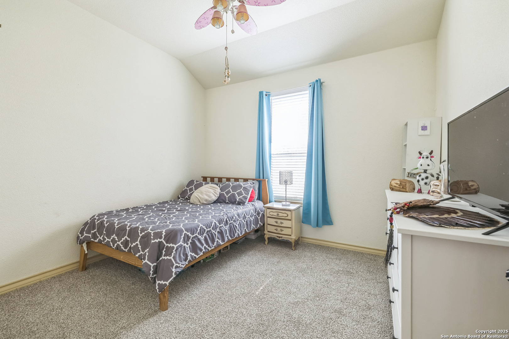 448 Western Bandera, TX 78003 - Photo 24 of 35 a bedroom with a bed and a window