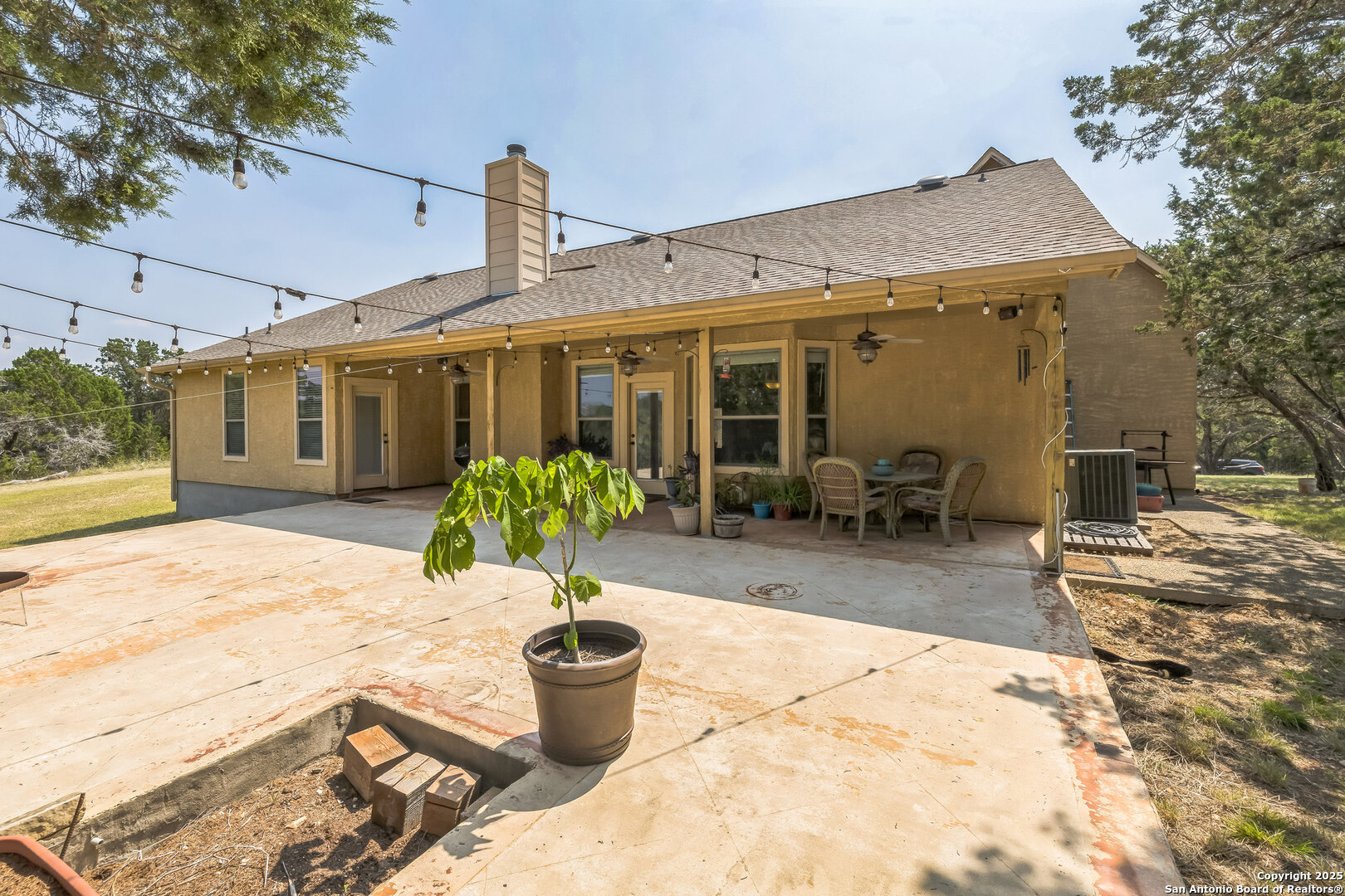 448 Western Bandera, TX 78003 - Photo 31 of 35 a view of a house with patio